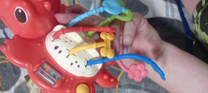 Фотография покупателя товара Развивающая игрушка «Динозаврик», цвет зелёный - Фото 6