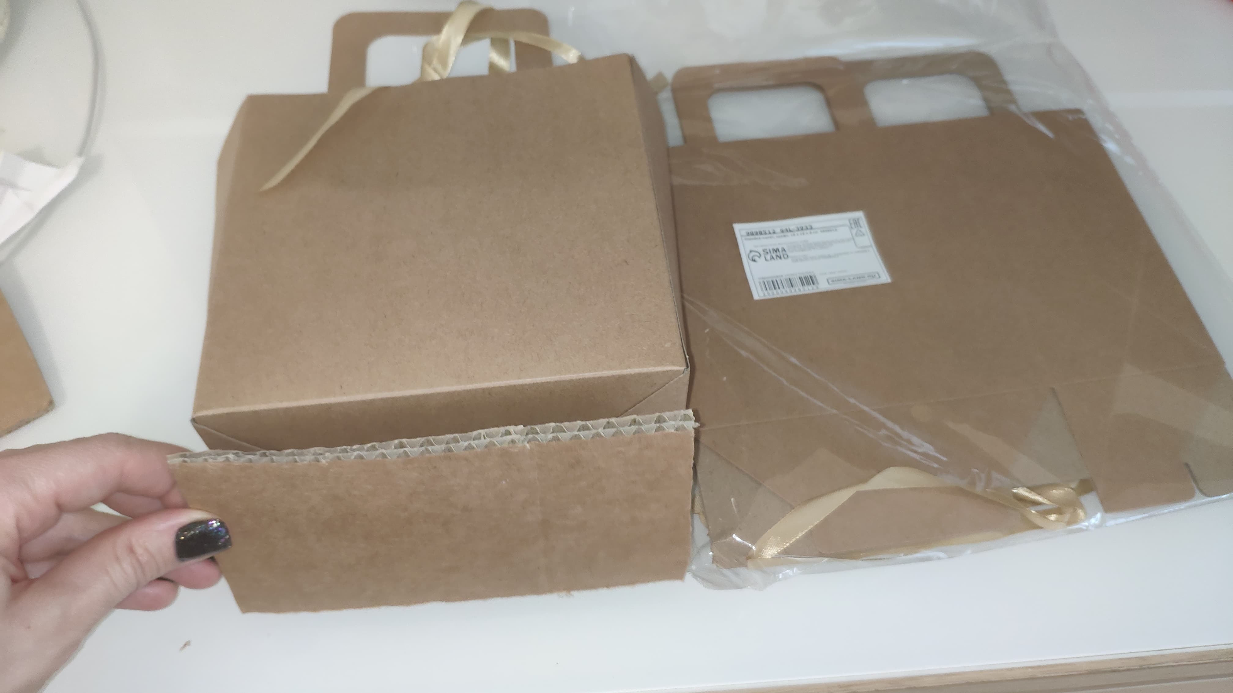 Фотография покупателя товара Коробка - пакет, крафт, 15×15×8 см - Фото 2