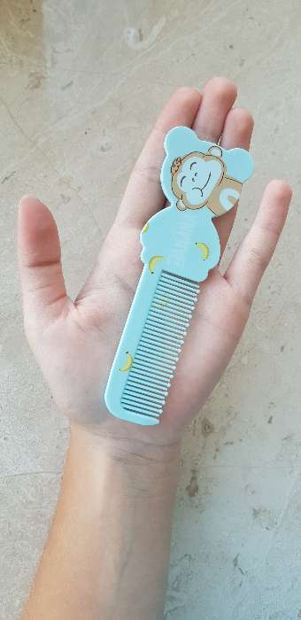 Фотография покупателя товара Расчёска фигурная «Детское счастье», 13 × 4 см, рисунок МИКС - Фото 7