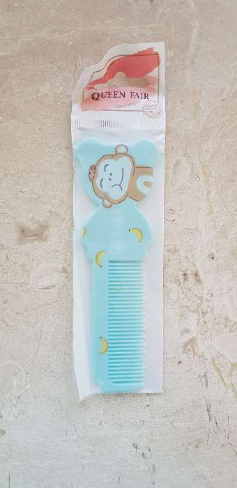 Фотография покупателя товара Расчёска фигурная «Детское счастье», 13 × 4 см, рисунок МИКС - Фото 5