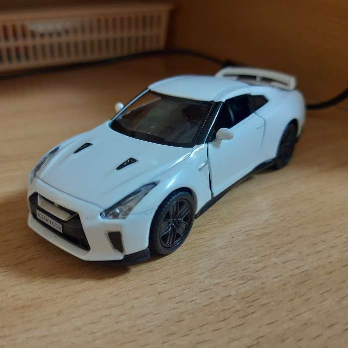 Фотография покупателя товара Машина металлическая NISSAN GT-R (R35), 1:32, открываются двери, инерция, цвет синий - Фото 1