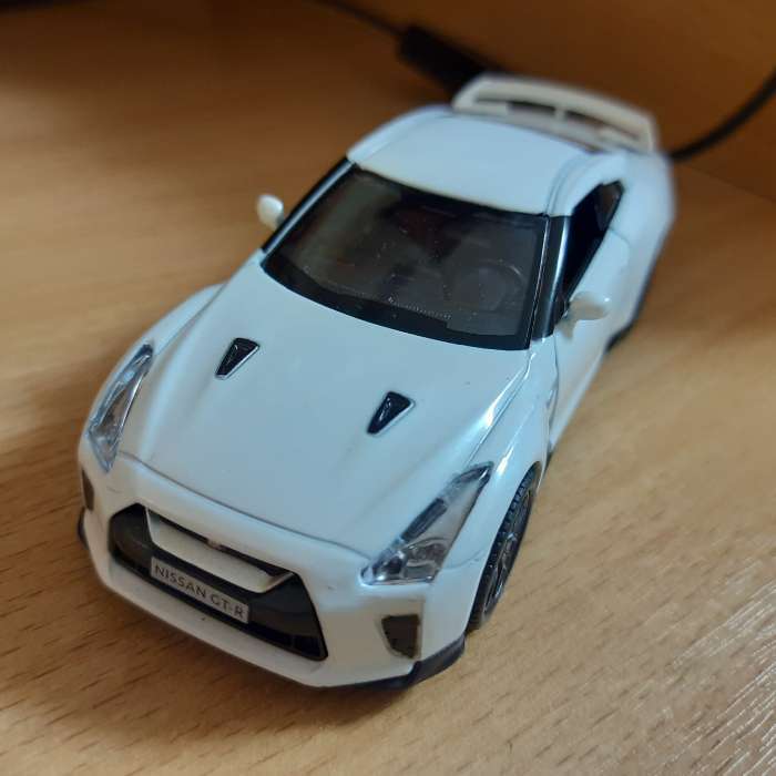 Фотография покупателя товара Машина металлическая NISSAN GT-R (R35), 1:32, открываются двери, инерция, цвет синий - Фото 2