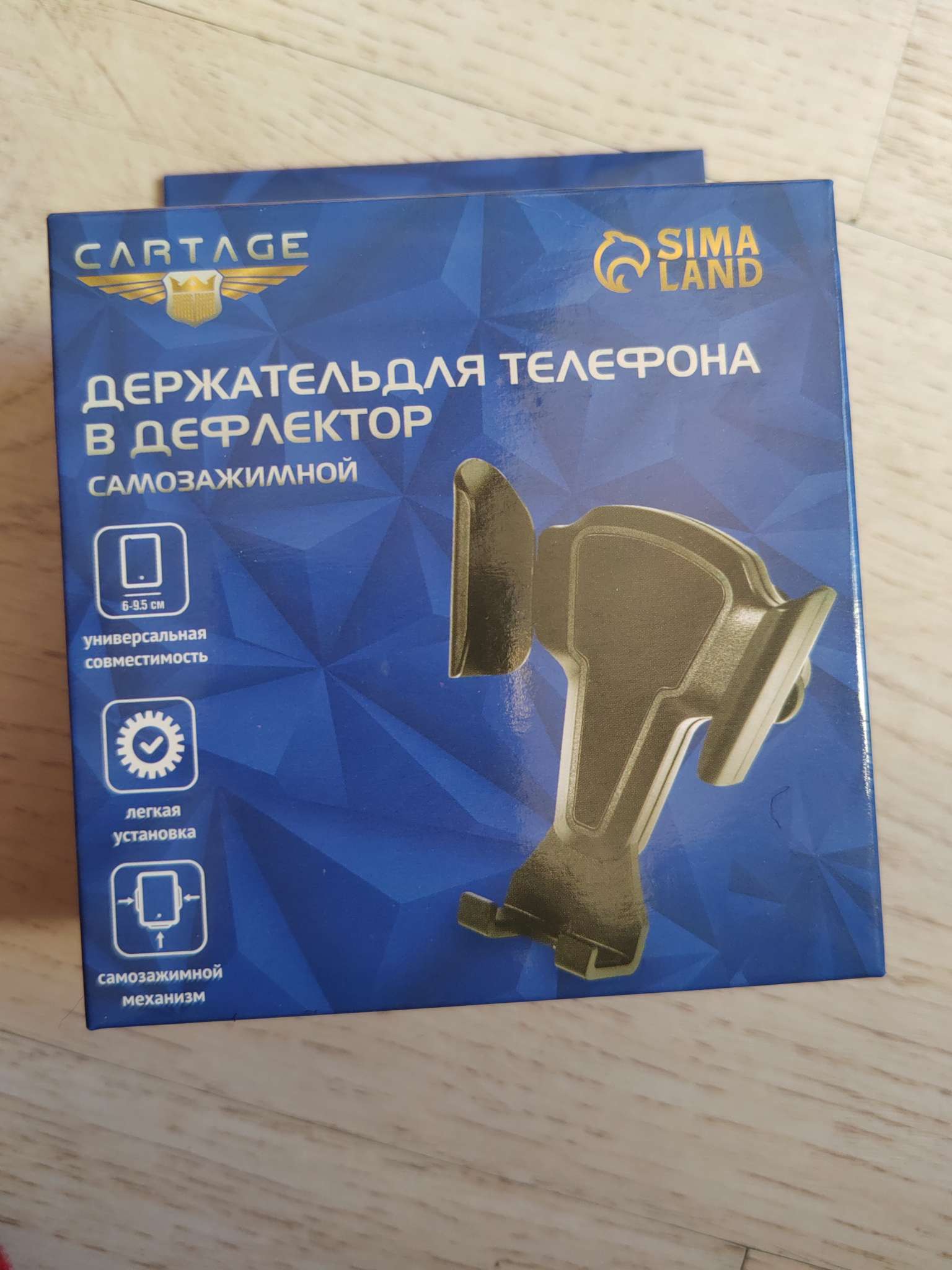 Фотография покупателя товара Держатель для телефона Cartage, самозажимной 6-9 см, чёрный, пластик - Фото 2
