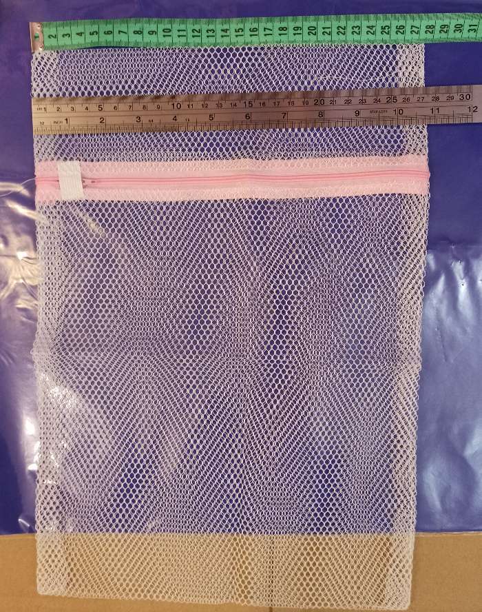 Фотография покупателя товара Мешок для стирки белья Доляна, 30×40 см, крупная сетка, цвет белый