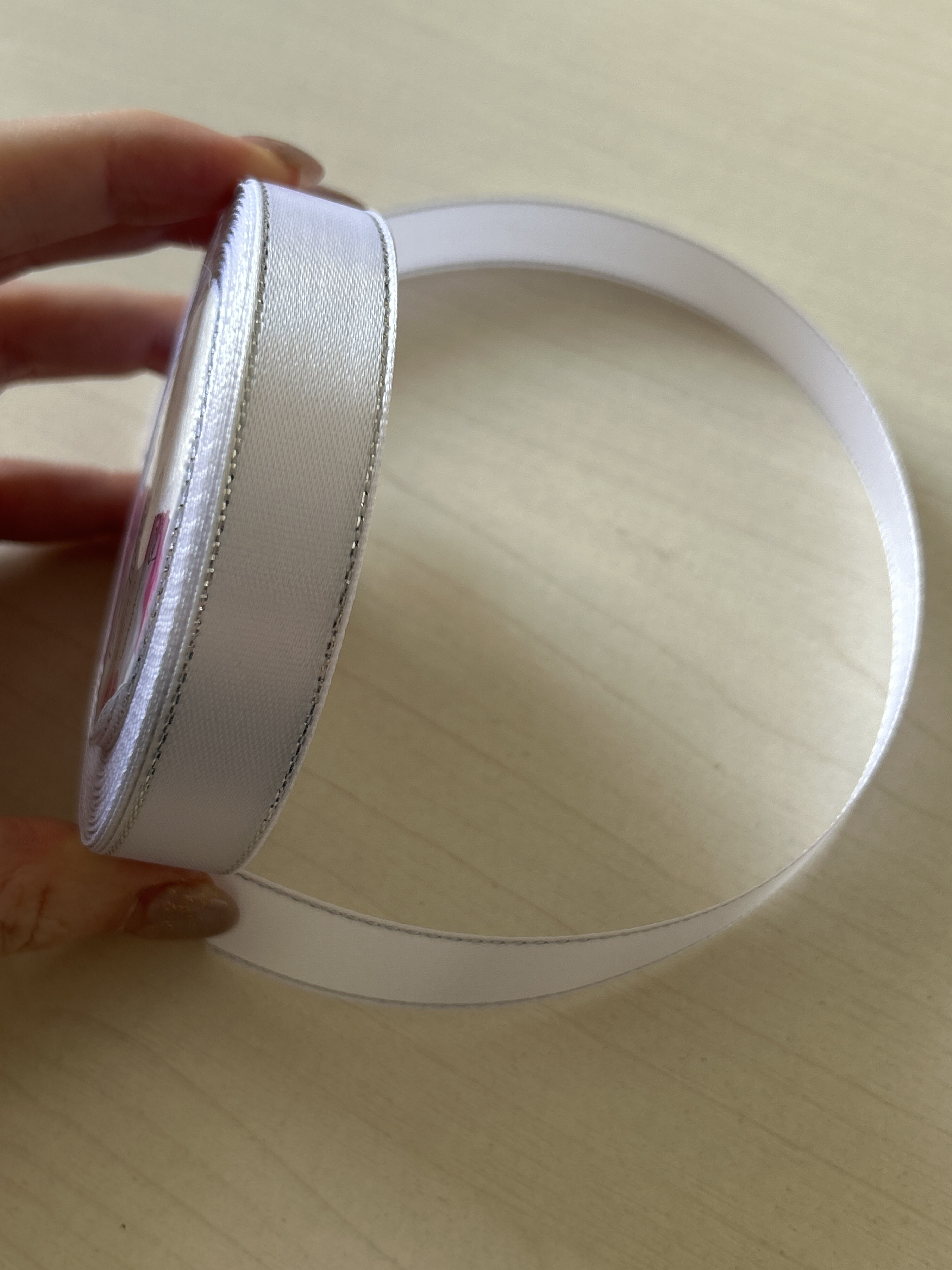 Фотография покупателя товара Лента атласная, с серебряным люрексом, 6 мм, 23±1 м, белая №001 - Фото 1