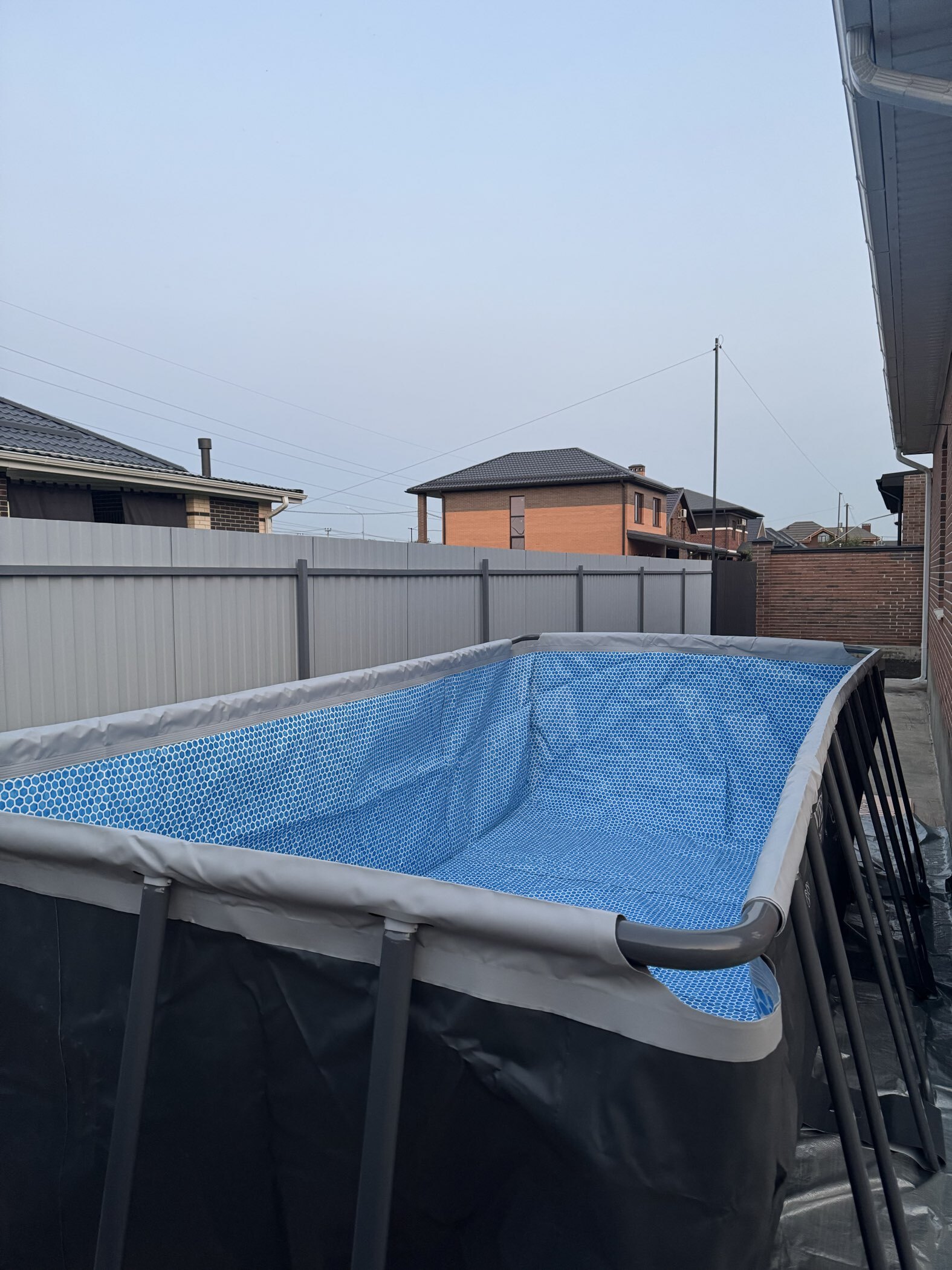 Фотография покупателя товара Бассейн каркасный Ultra XTR Frame, 549×274×132 см, песчаный фильтр-насос, лестница, тент, подстилка, 26356NP INTEX - Фото 2