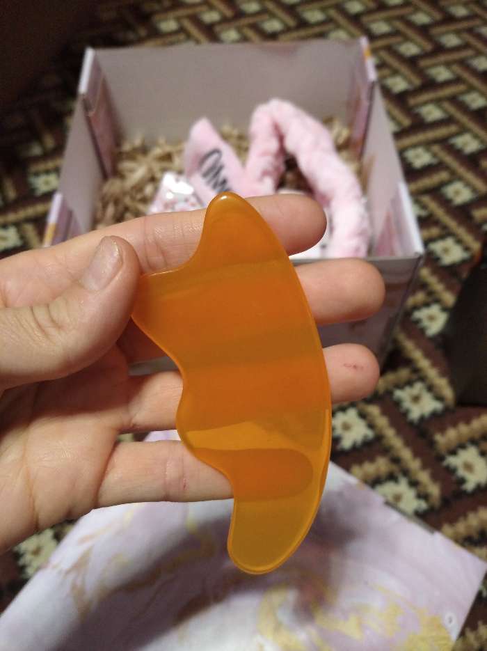 Фотография покупателя товара Массажёр гуаша «Скребок», 10 × 4,5 см, цвет оранжевый
