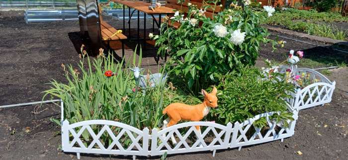 Фотография покупателя товара Садовая фигура из полистоуна «Оленёнок», 46×41×10 см - Фото 2