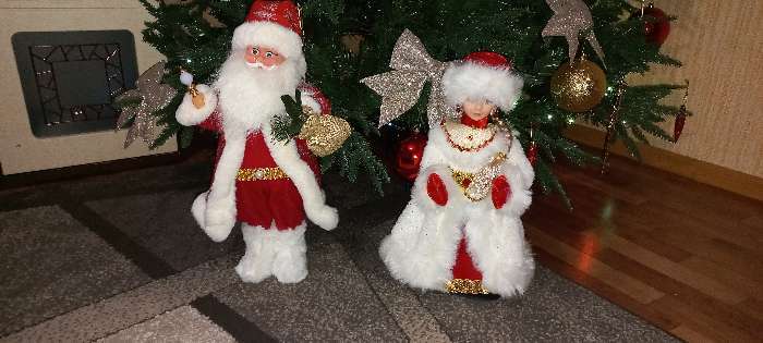 Фотография покупателя товара Дед Мороз "В красной шубке в ёлочках с подарками" двигается, 23х45 см