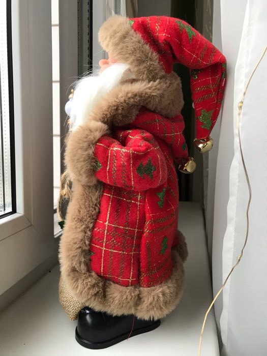 Фотография покупателя товара Дед Мороз "В красно-белой шубке в клетку с подарками" двигается, 17х30 см - Фото 15