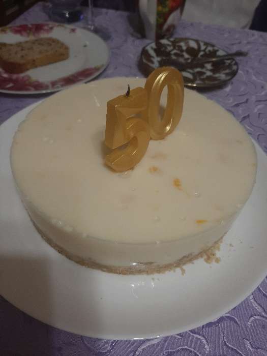Фотография покупателя товара Свеча в торт "Грань", цифра "0", золотой металлик, 6,5 см - Фото 3