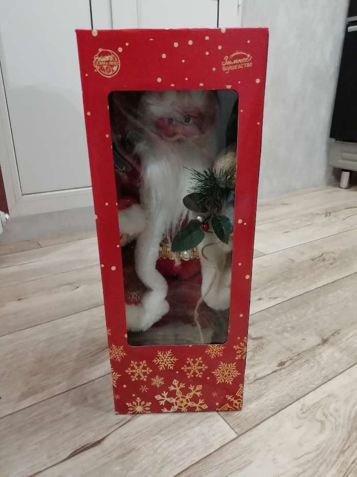 Фотография покупателя товара Дед Мороз "В красной шубке в ёлочках с подарками" двигается, 23х45 см - Фото 2