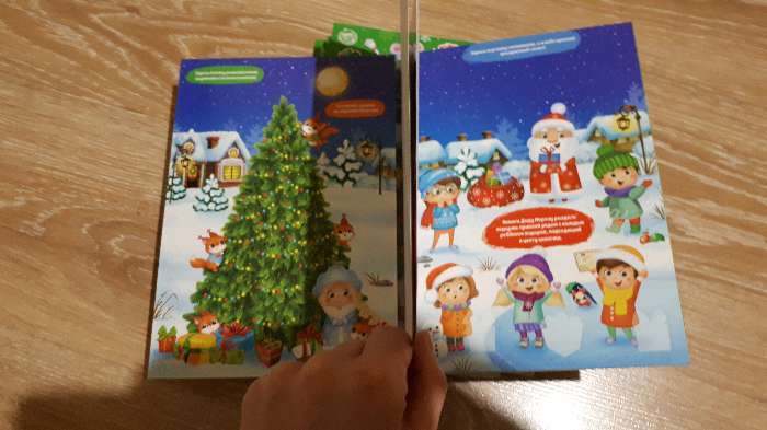 Фотография покупателя товара Книжка со скретч-слоем и многоразовыми наклейками «Новогодние задания»