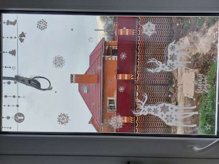 Фотография покупателя товара Наклейки для окон «Cнежинки», многоразовая, 33 х 50 см, Новый год - Фото 45