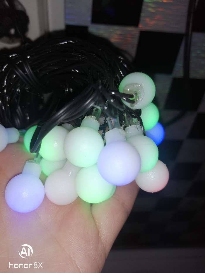 Фотография покупателя товара Гирлянда «Нить» 5 м с насадками «Шарики белые», IP20, тёмная нить, 20 LED, свечение мульти (RG/RB), мигание, 220 В