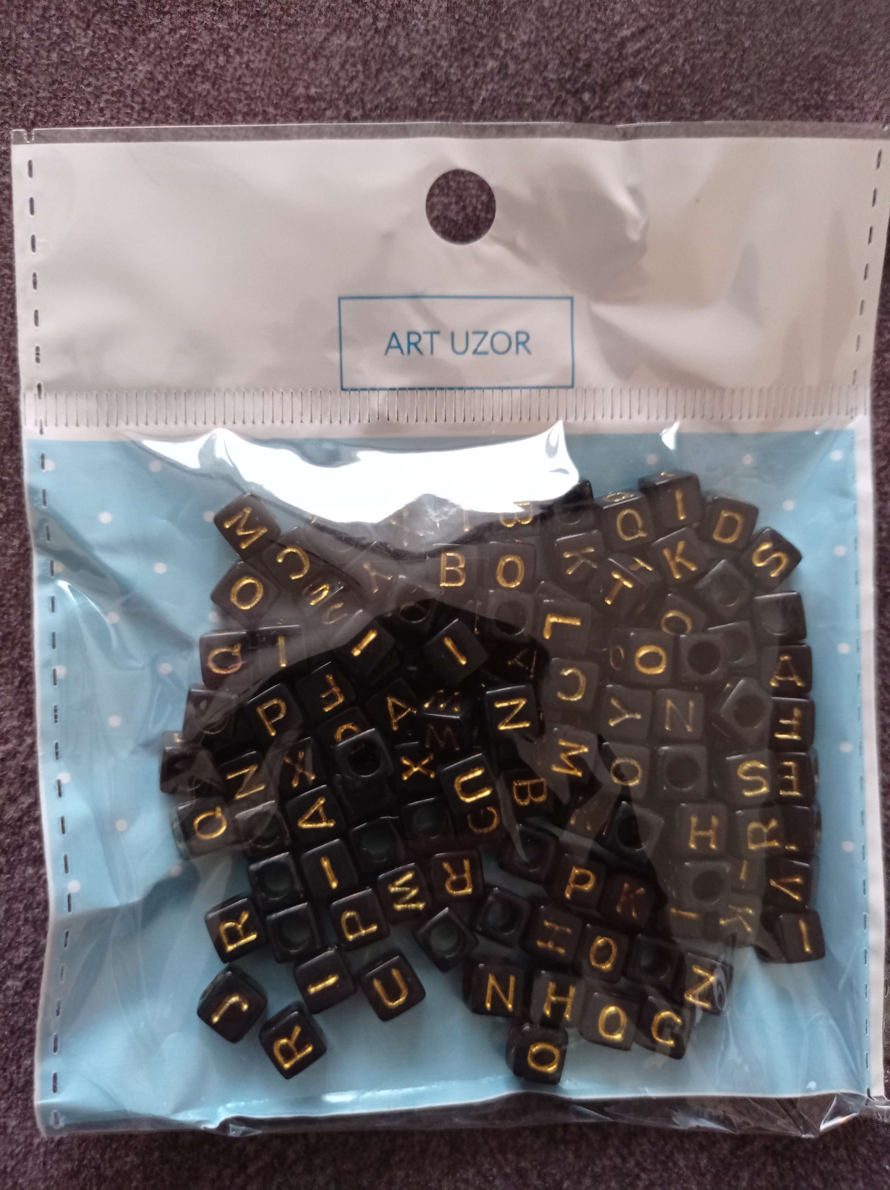 Фотография покупателя товара Бусины для творчества пластик "Английские буквы на кубике" чёрно-золот набор 20 гр 0,6х0,6 см   5194