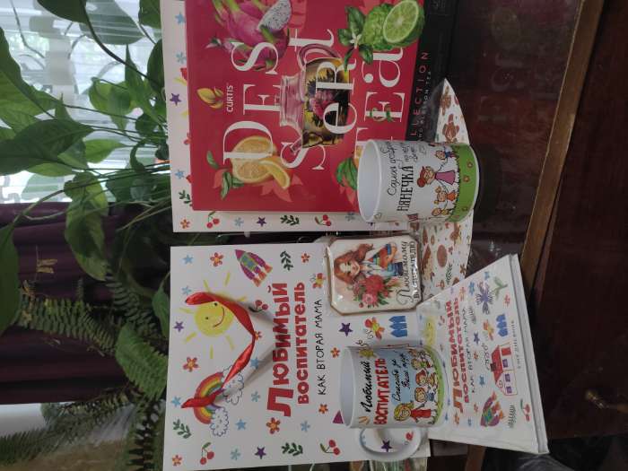 Фотография покупателя товара Пакет подарочный ламинированный, упаковка, «Лучшему учителю», M 30×26×9 см - Фото 1