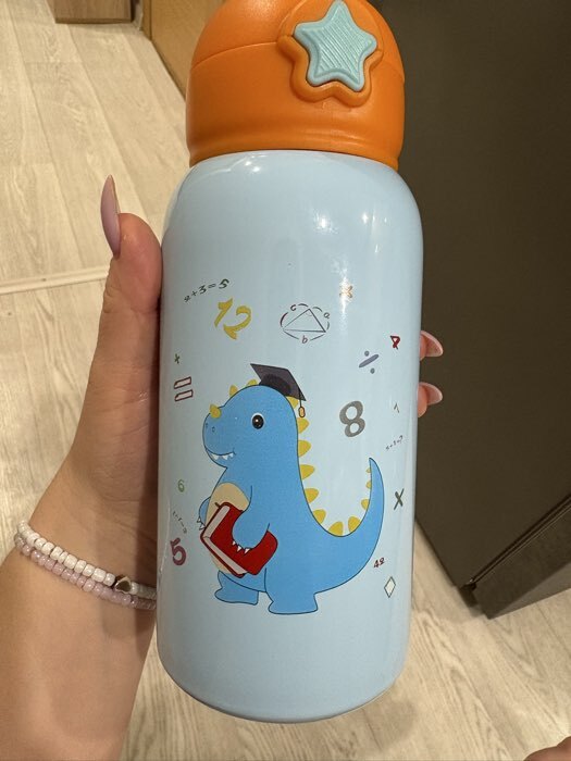 Фотография покупателя товара Термос детский «Динозавр», 600 мл, с кружкой, два вида крышек, сохраняет тепло до 8 ч, нержавеющая сталь, голубой, оранжевый - Фото 1