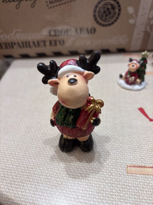 Фотография покупателя товара Фигурка полистоун «Оленёнок в красной шубе и зелёном шарфике», 7.5×4.2×7.5 см, МИКС - Фото 1