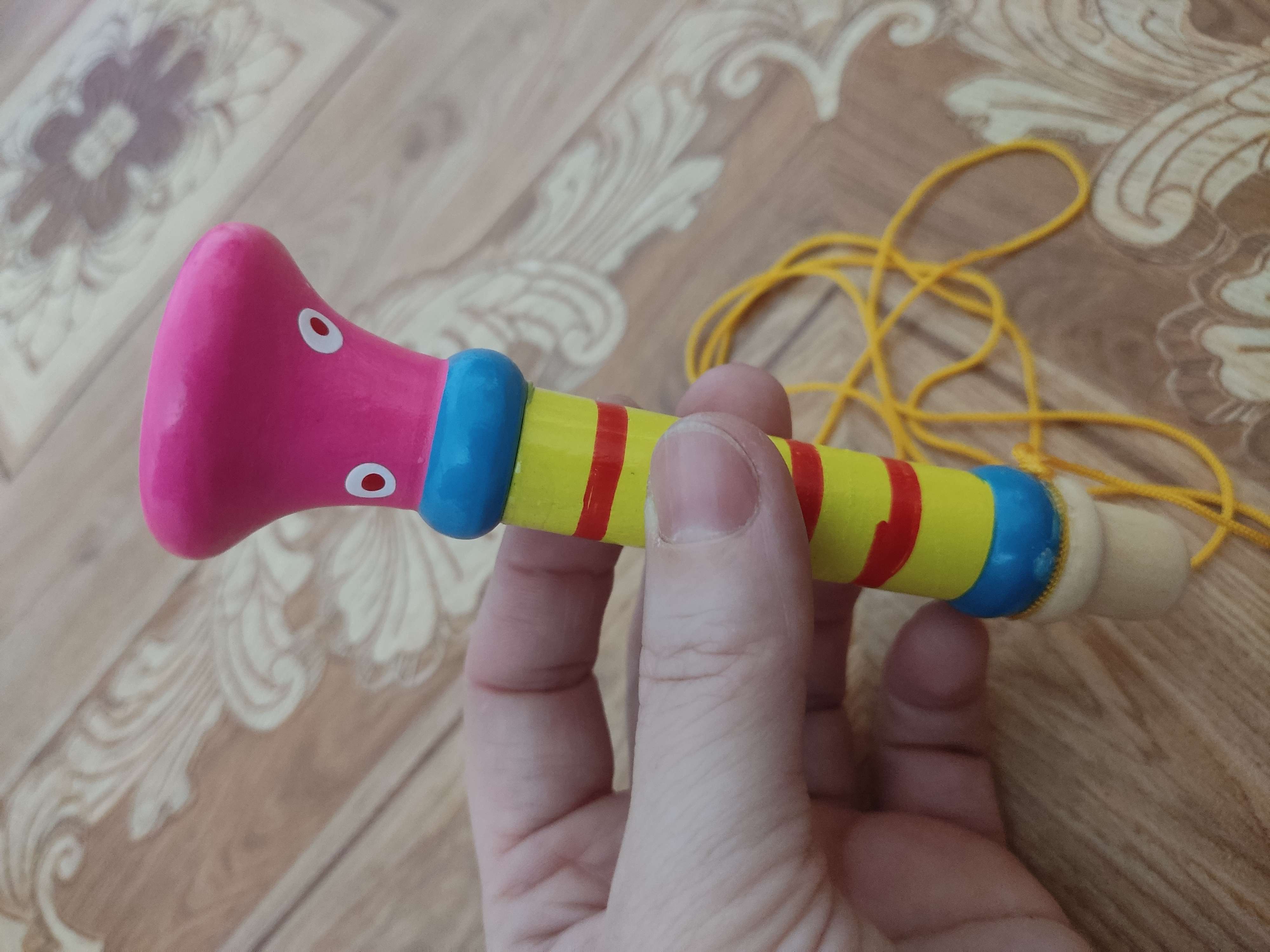 Фотография покупателя товара Музыкальная игрушка «Дудочка на веревочке», высокая, цвета МИКС - Фото 5