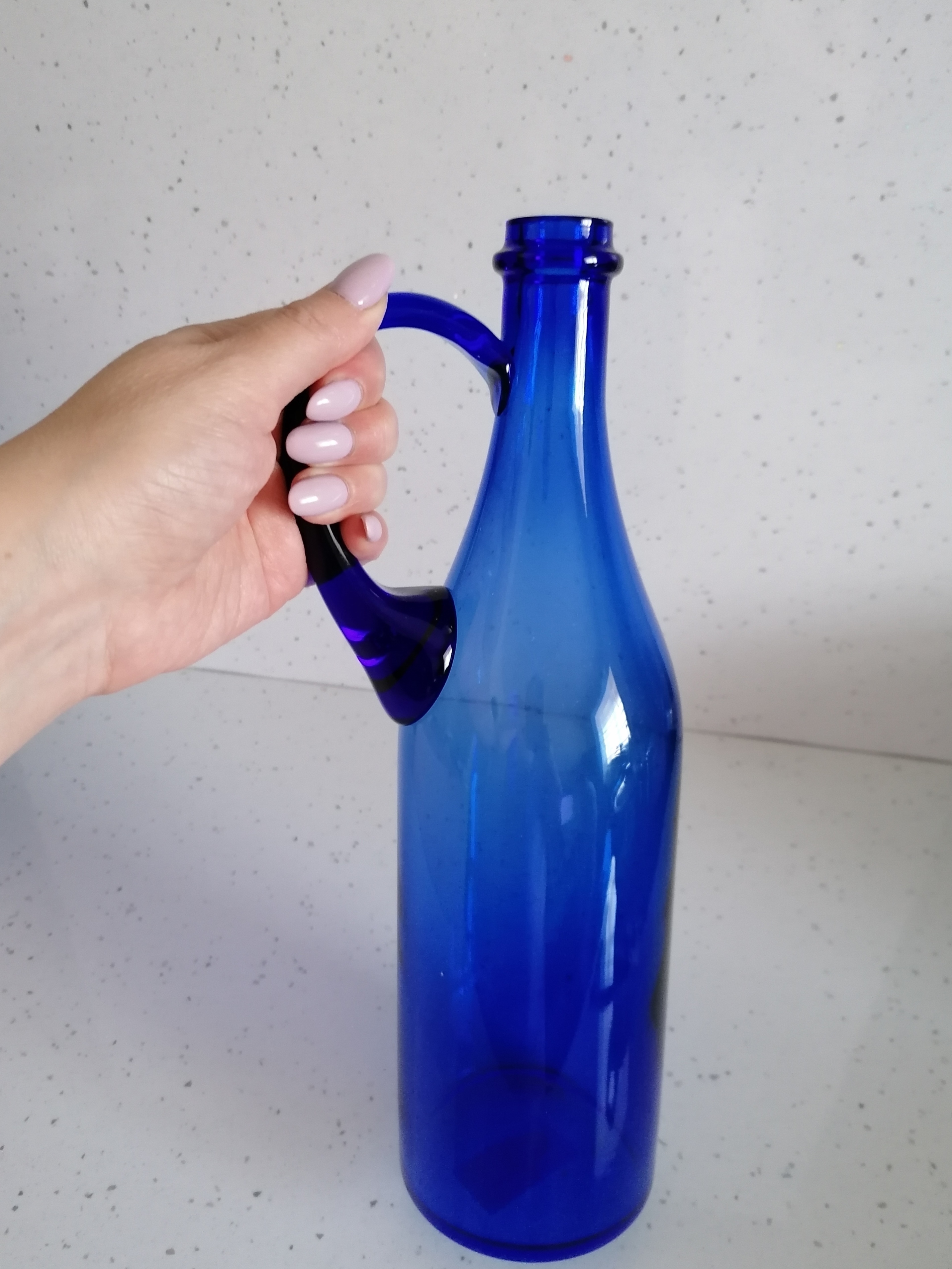 Фотография покупателя товара бутыль "Литр Руч. 1л." d(дна)=9см H=32cм. из синего стекла (без декора)