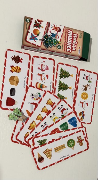 Фотография покупателя товара Развивающая игра «Новогодние задания. Найди лишнее», 20 заданий, 3+ - Фото 1