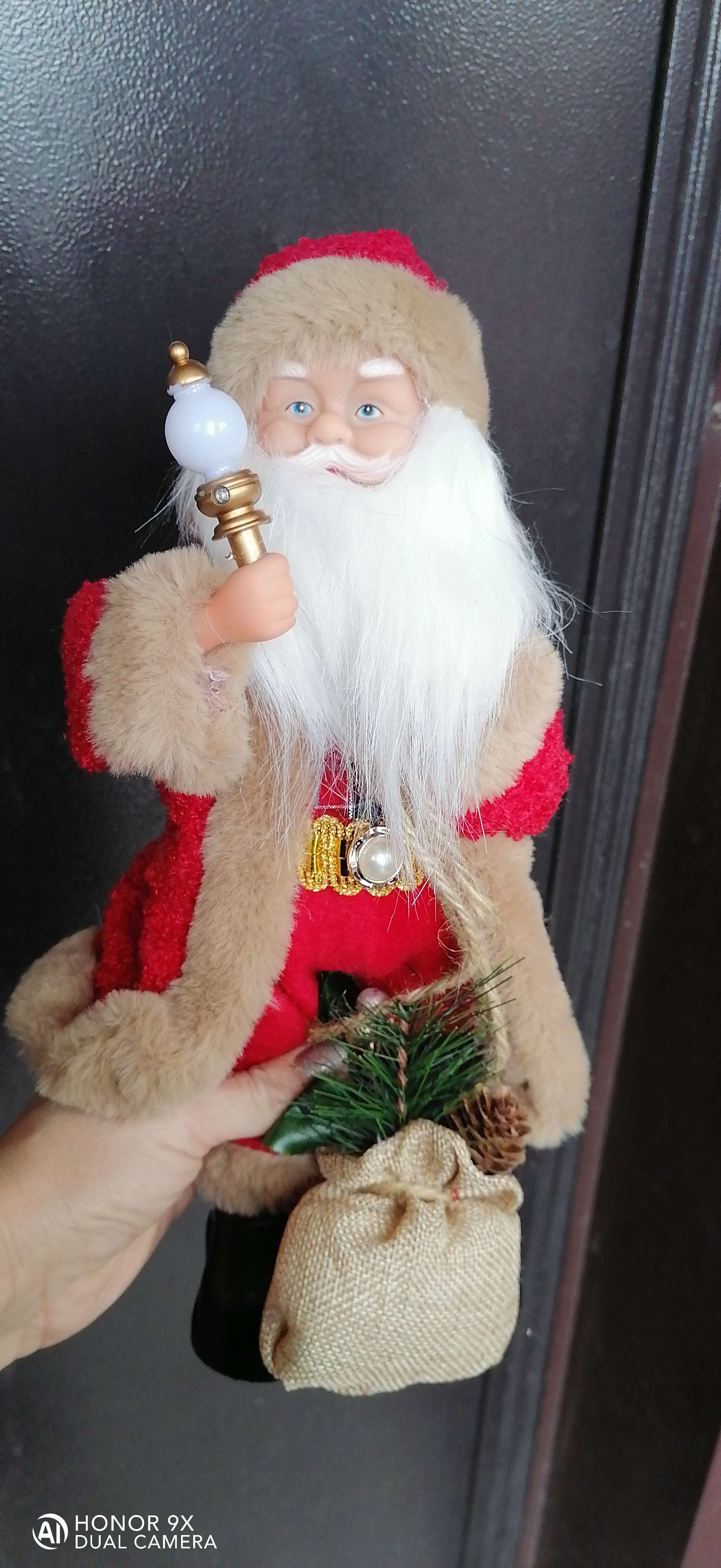 Фотография покупателя товара Дед Мороз "В красной шубке в клетку с подарками" двигается, 30 см - Фото 3