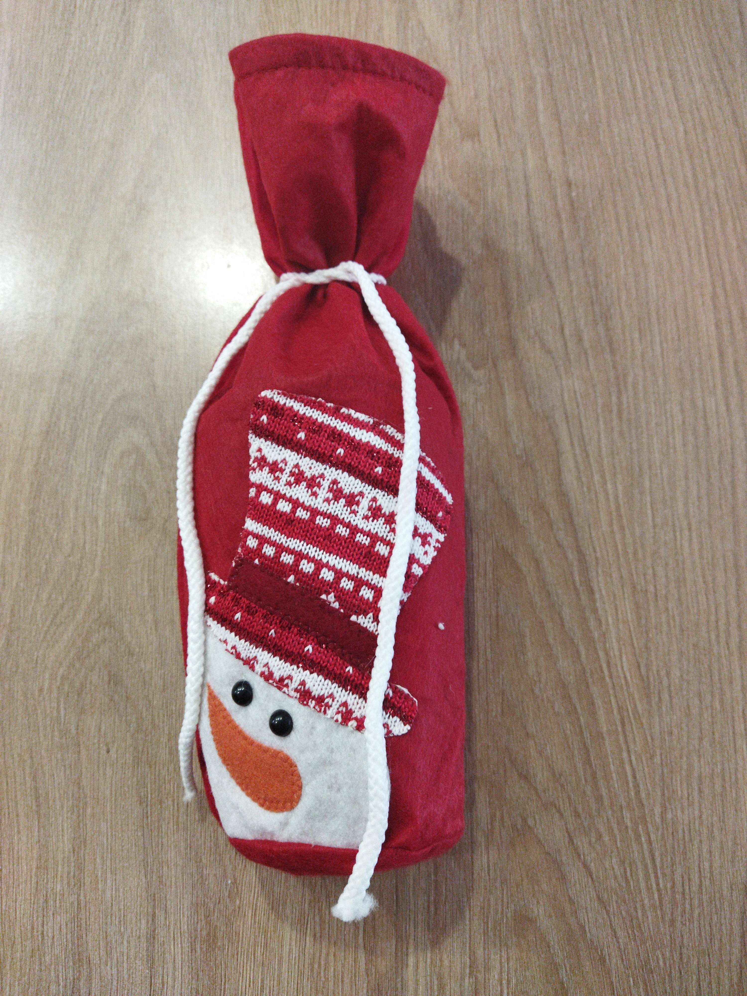 Фотография покупателя товара Чехол на бутылку «Снеговик в шляпке», на завязках