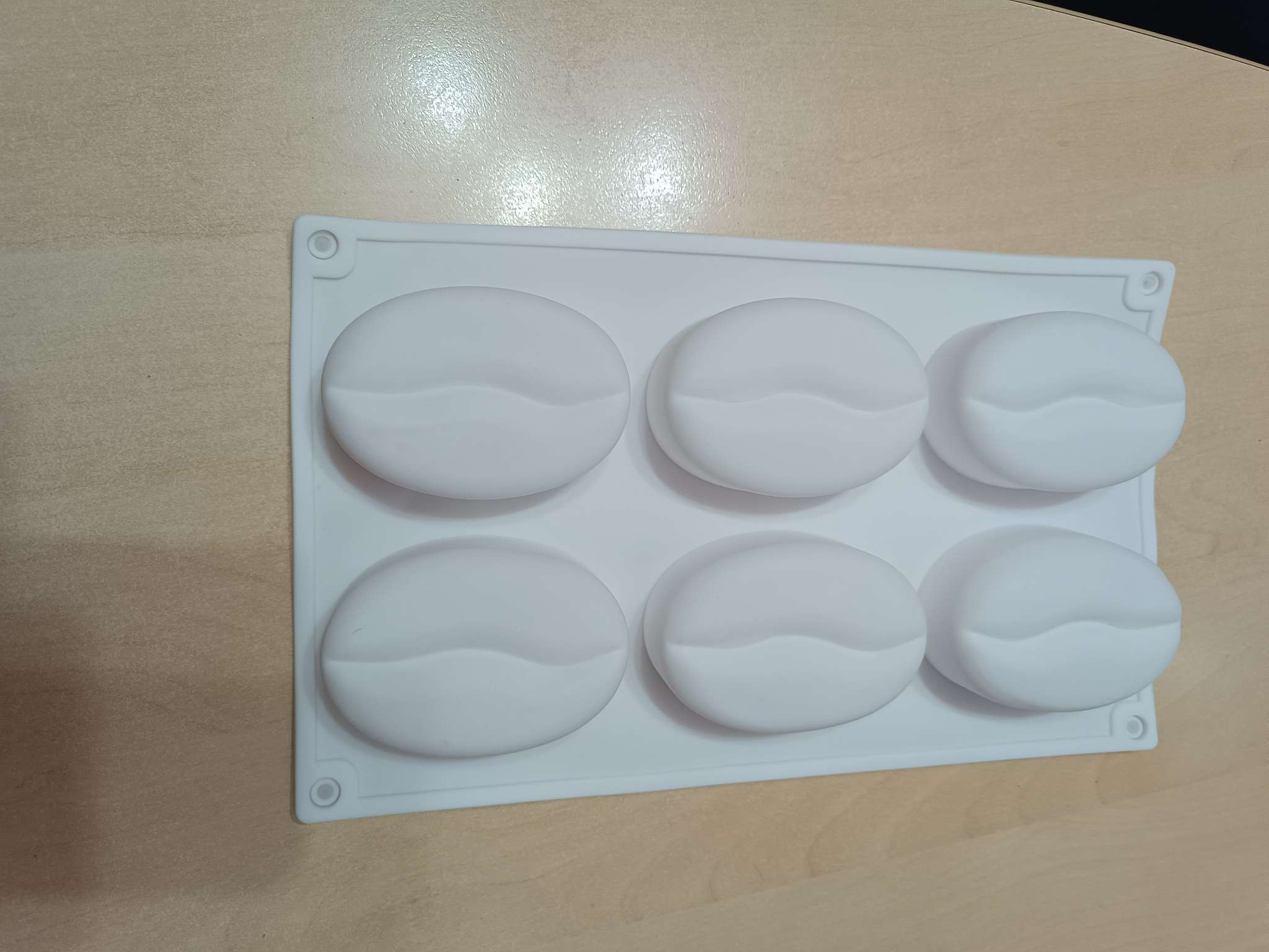 Фотография покупателя товара Форма для муссовых десертов и выпечки Доляна «Кофейные зёрна», силикон, 28.5×17×2.5 см, 6 ячеек (8×6 см), цвет белый - Фото 4