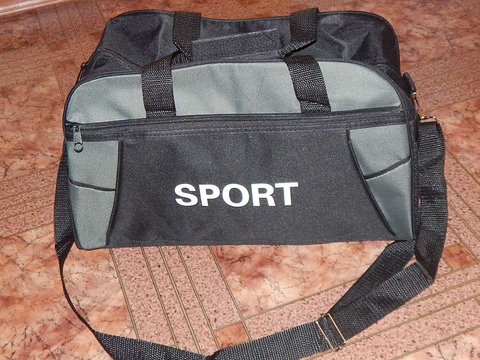 Фотография покупателя товара Сумка спортивная, отдел на молнии, наружный карман, с ручкой, длинный ремень, цвет чёрный/серый - Фото 1