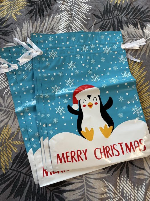 Фотография покупателя товара Пакет подарочный новогодний с завязками, «Зимний лес», 29×43 см - Фото 1