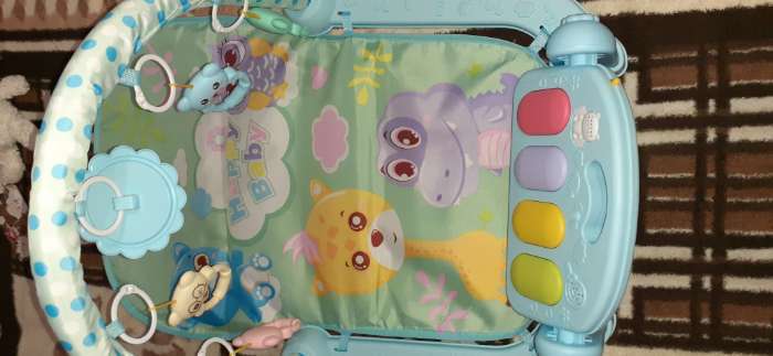 Фотография покупателя товара Развивающий музыкальный коврик «Малыш», пианино, 4 игрушки, зеркало, размер 110×83 см - Фото 1